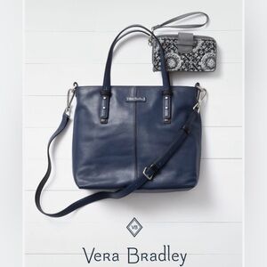 Excellent Used Condition Vera Bradley, Navy Leather Purse with black accents.